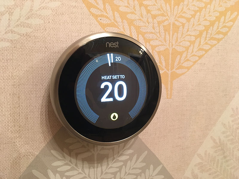 Nest thermostat on the wall